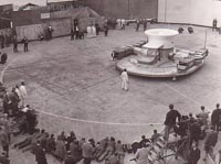 The SRN1 being manufactured - The first flight of the SRN1 on the concrete slipway at East Cowes. The astonished crowd of photographers and journalists would have seen nearly a foot of air beneath the craft during its hover. Note the ground wheels attached to the four corners of the craft (Peter Insole).