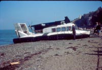 The SRN5 takes Passengers - Waiting on the beach in Westland colours (Ernie Dunn).