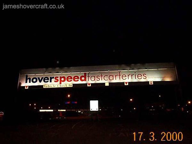 Dover Western Docks hoverport - Hoverspeed logo lit up on the gantry spanning the entry-exit lanes (James Rowson)