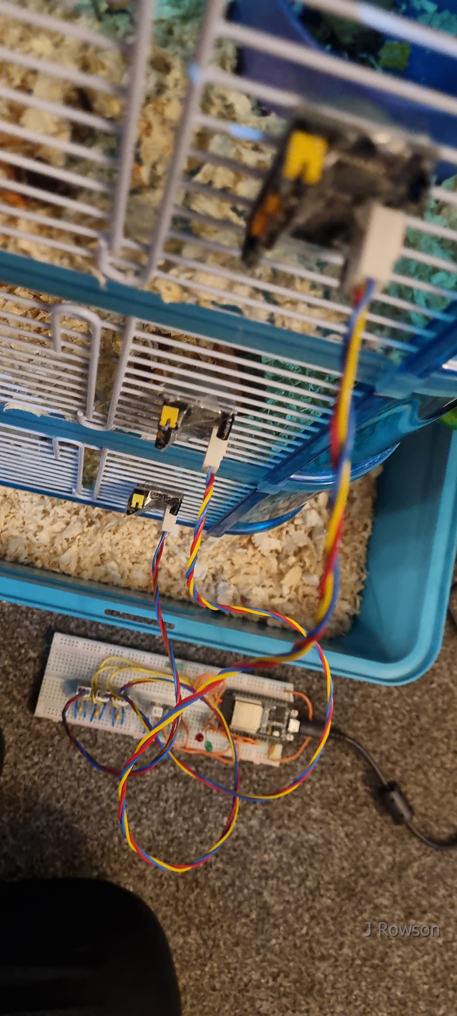 Monitoring Diesel (the Hamster)'s Movements - Multiple motion sensors attached to cage (credit: James Rowson).